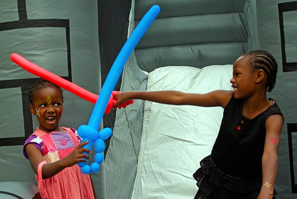 Sisters Nyambura and Kwavi having a duel.