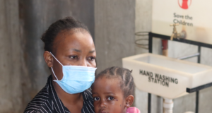 Maximilla Kangahi with her daughter at the Beyond Zero clinic in Karanja, Kibera.