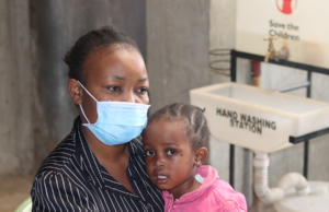 Maximilla Kangahi with her daughter at the Beyond Zero clinic in Karanja, Kibera.